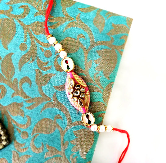 Kundan Embellished Rakhi - Fuchsia